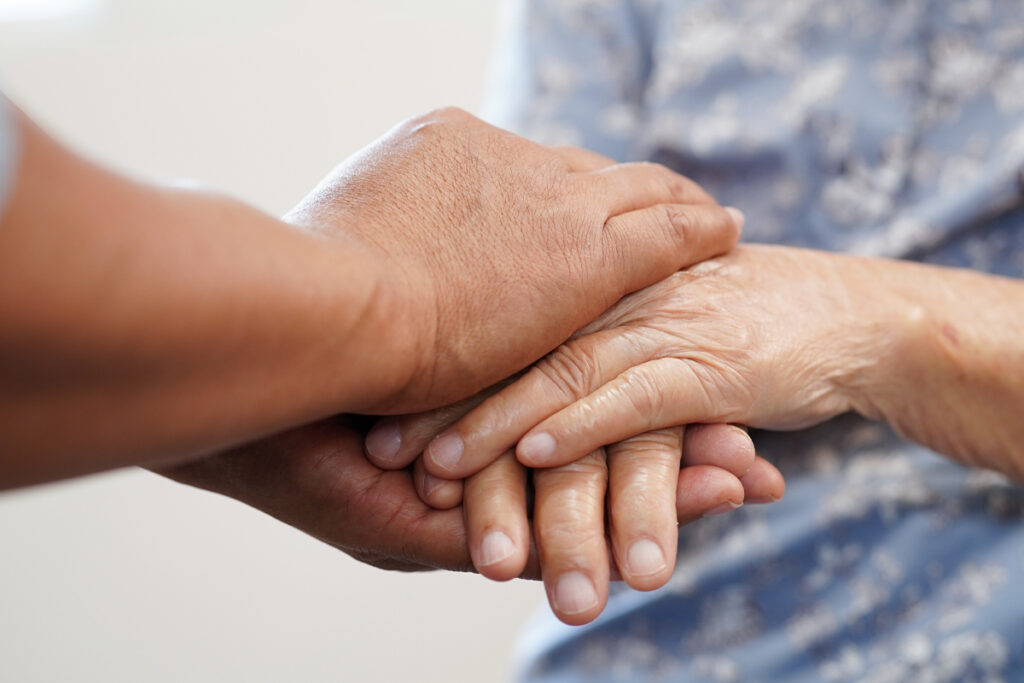 Hands holding each other